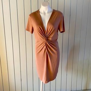 H&M tshirt blush color knot dress. Fits size 12